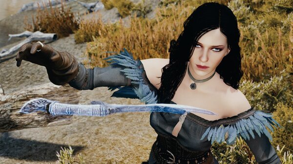 Йенн берет призванный кинжал.