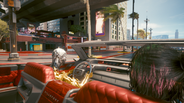 Ви-Робот едет в золотом кабриолете.