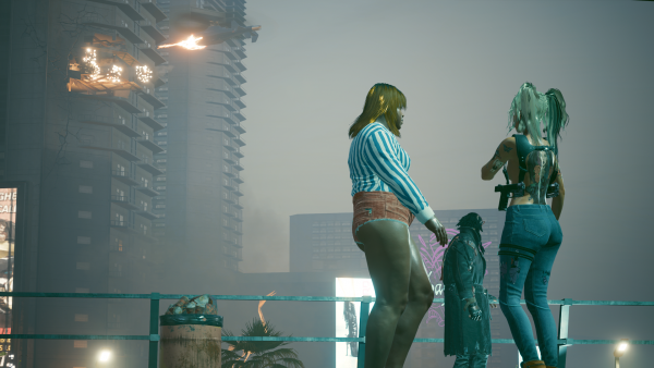 Вертолёт Мелитеха атакует верхние этажи высотки.