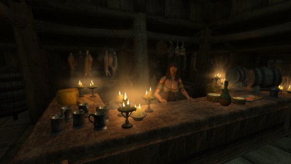 Красиво свечки горят на столе.