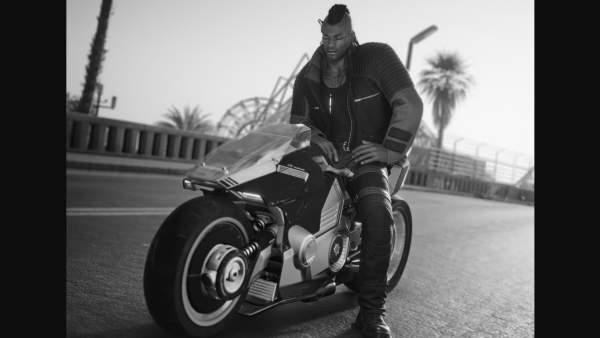 Пласид на мотоцикле в новой одежде.