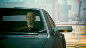 Курт управляет машиной с Ви и бегущая ню Люси.